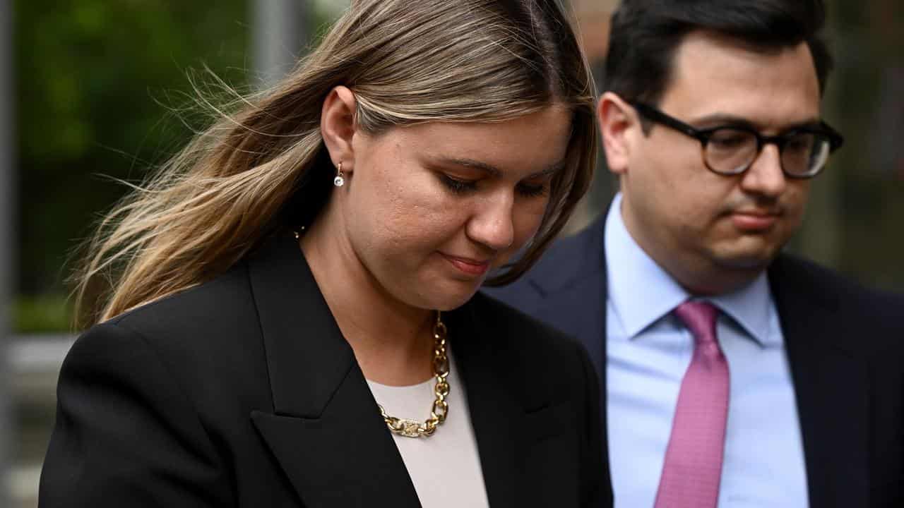 Brittany Higgins leave the Federal Court in Sydney.