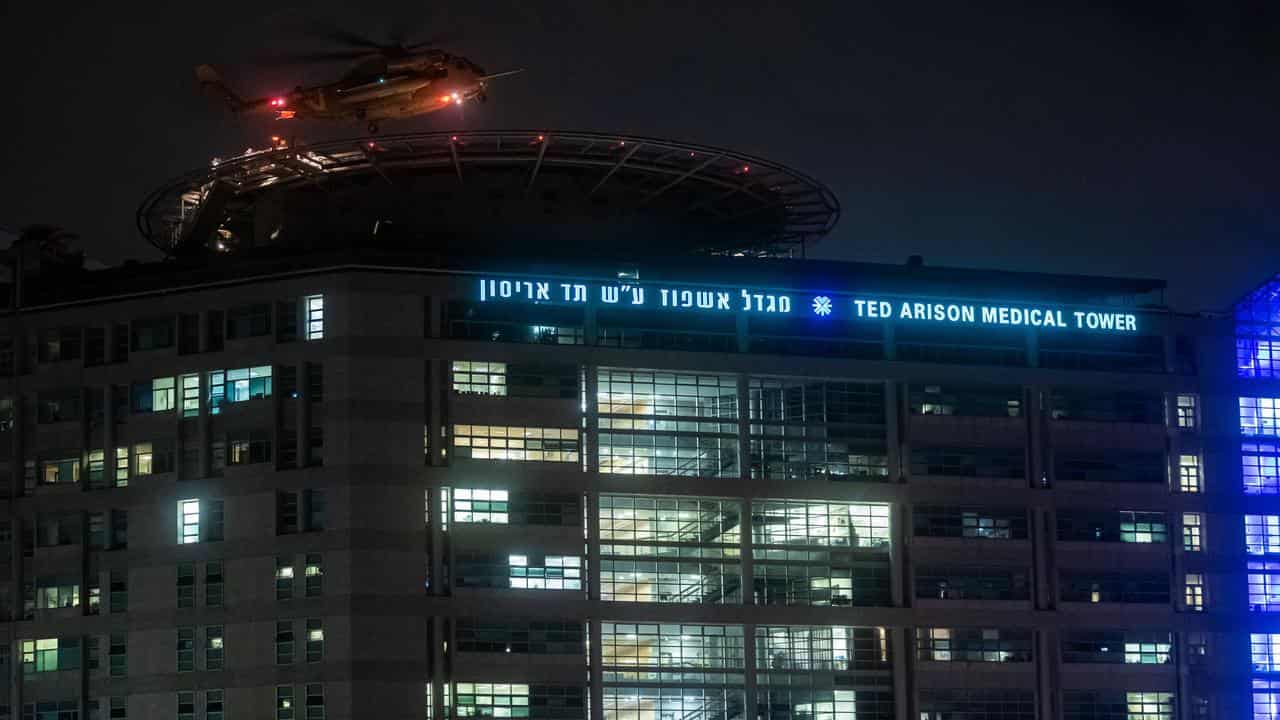 An Israeli helicopter transporting hostages lands at hospital