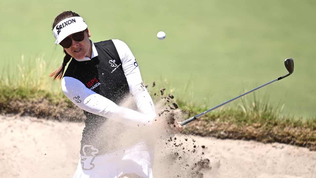 Hannah Green pitches out of a bunker during 2022's Australian Open.