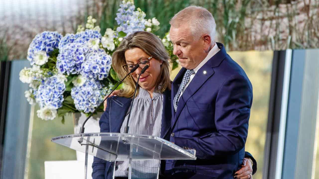 Grant and Emma Stevens speak at the service for their son Charlie