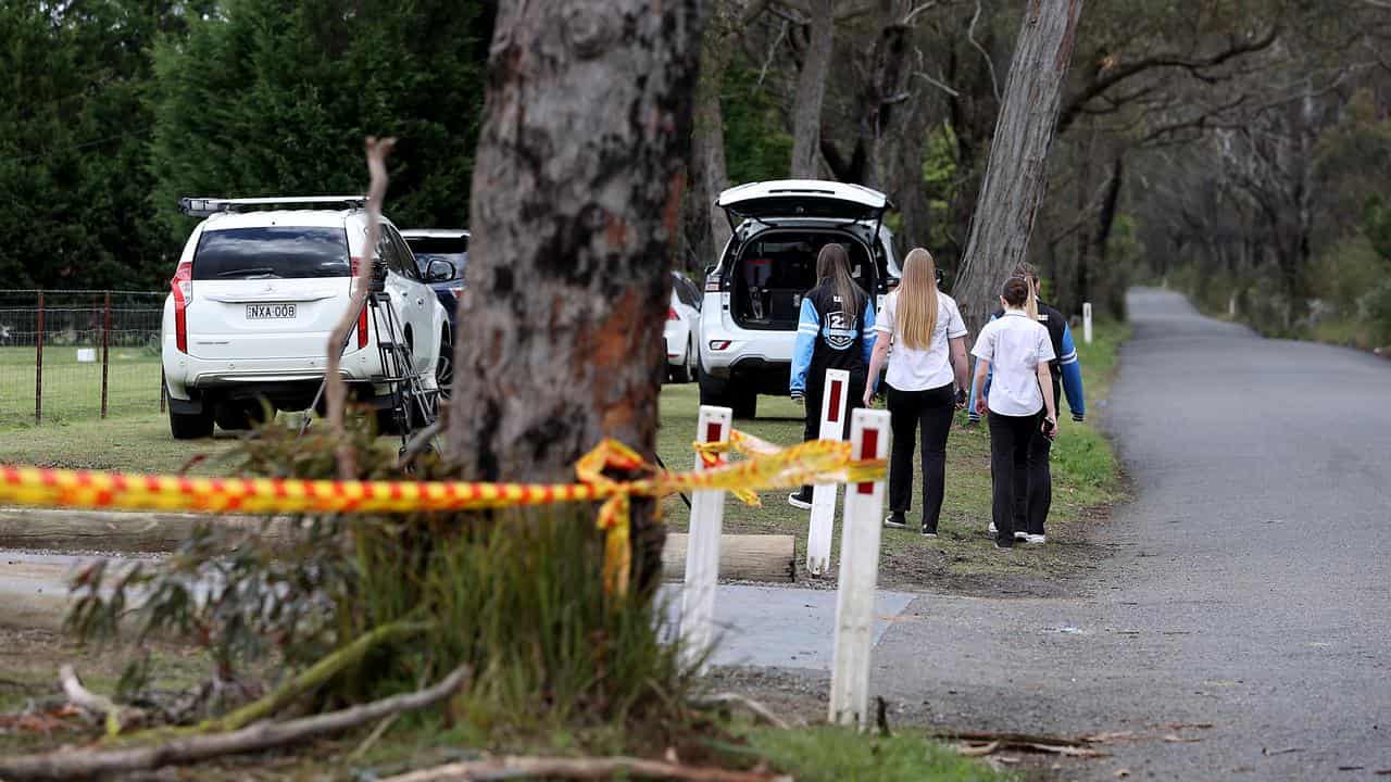 Picton High School students leave flowers at the crash site at Buxton.