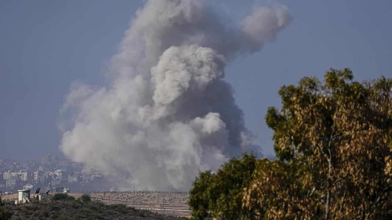 Smoke rises following an Israeli airstrike in Gaza