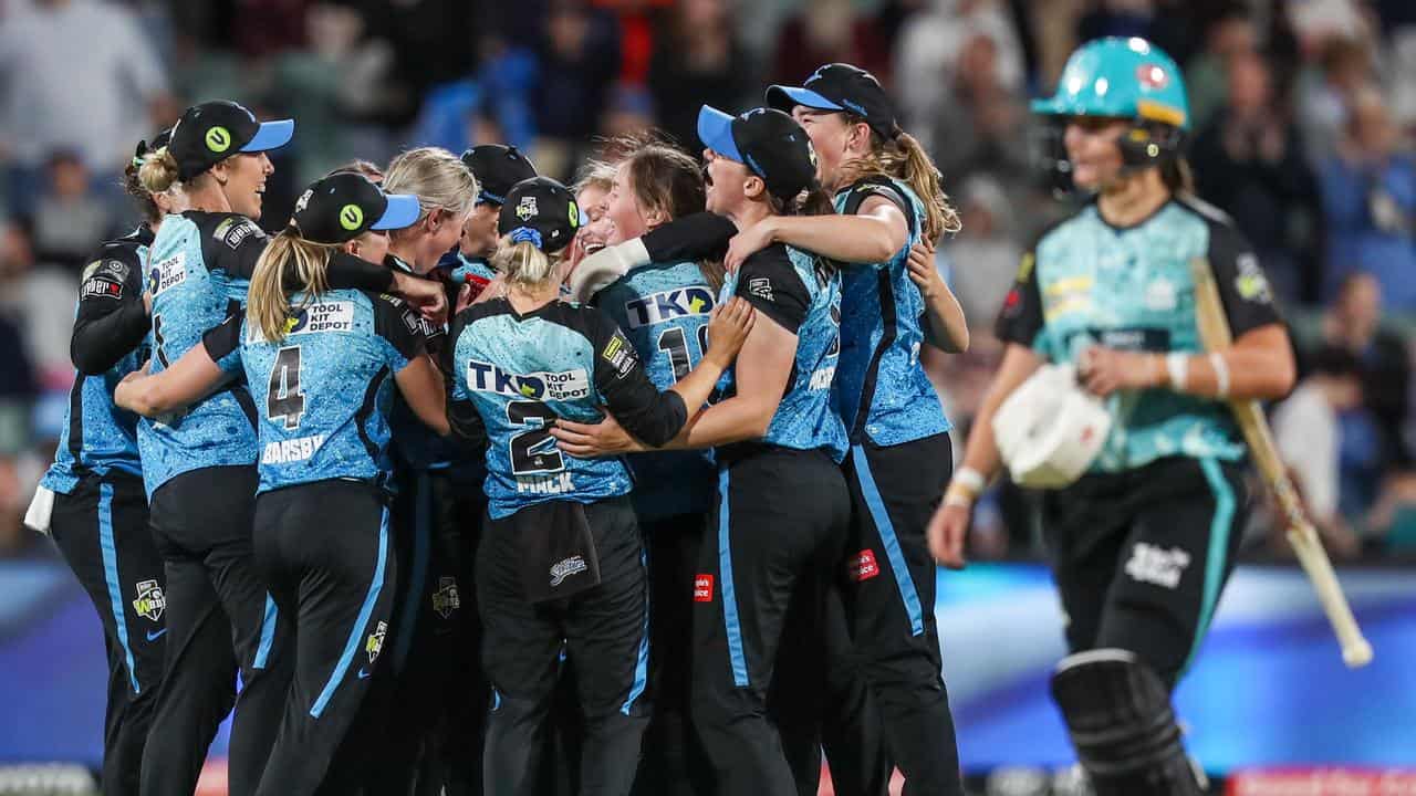 Adelaide Strikers celebrate WBBL final victory over Brisbane Heat.