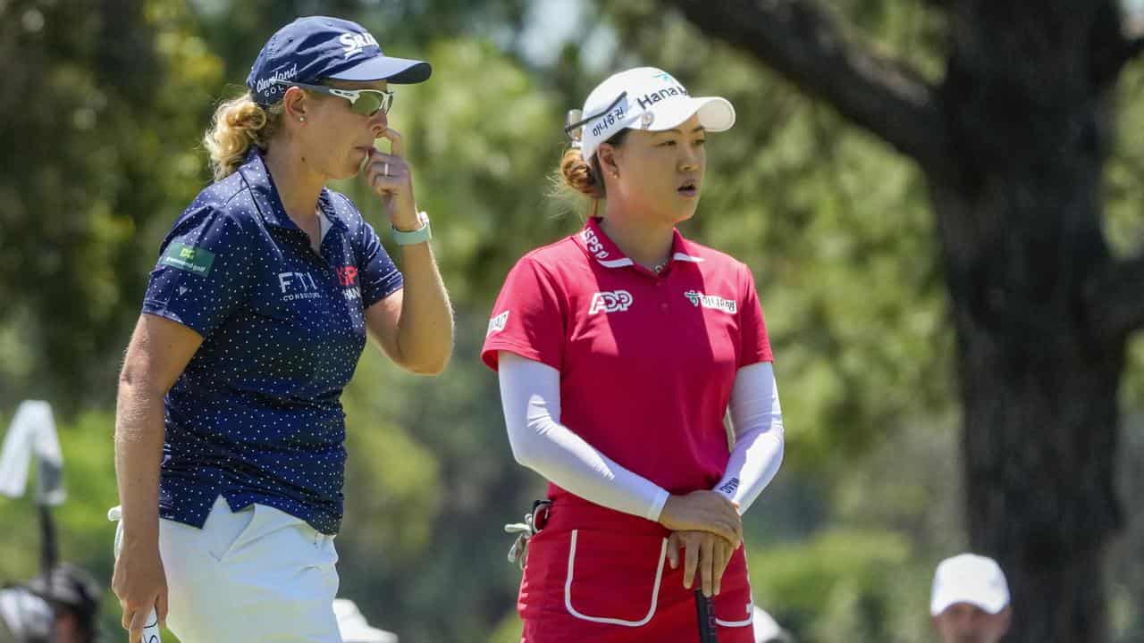 South Africa's Ashleigh Buhai (left) and Australia's Minjee Lee