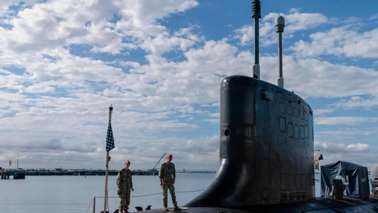 Crew members of a US Virginia-class nuclear powered submarine.