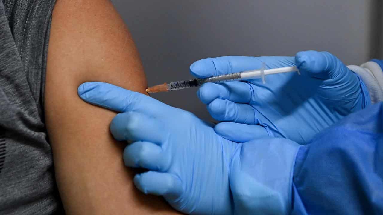 A person receives a COVID-19 vaccination (file image)