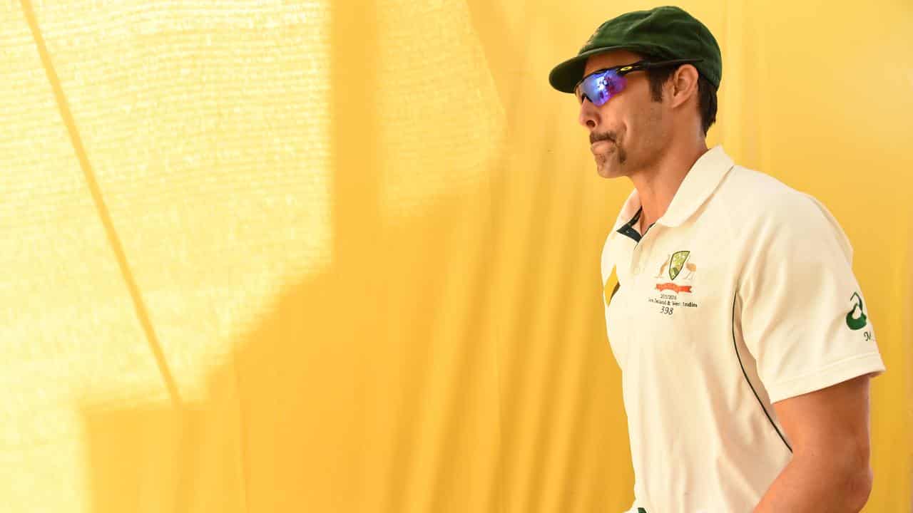 Mitchell Johnson walks onto the field for Australia in 2015.