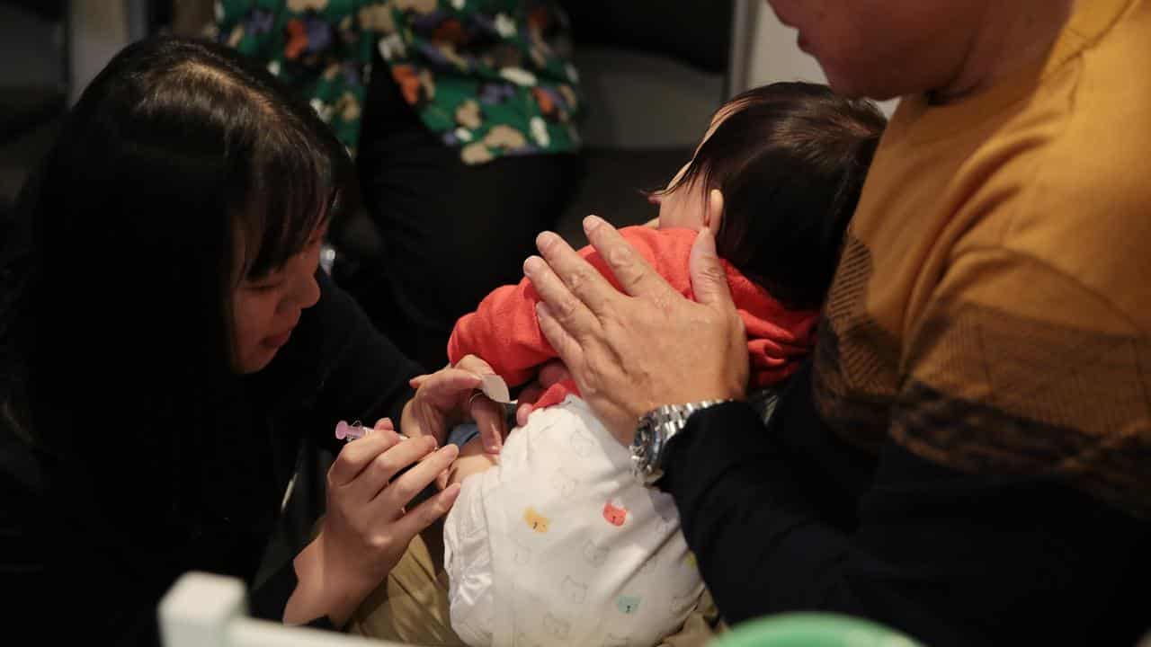 A baby receives a vaccination (file image)