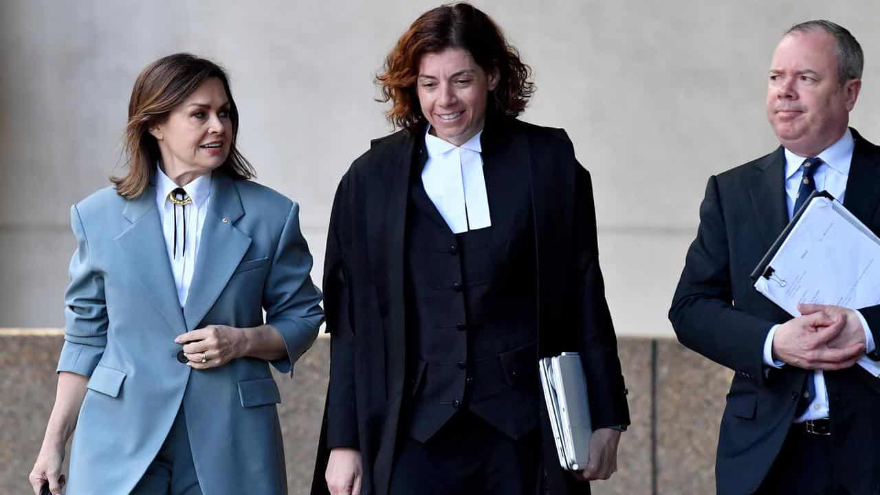 Lisa Wilkinson (left) and her legal team.