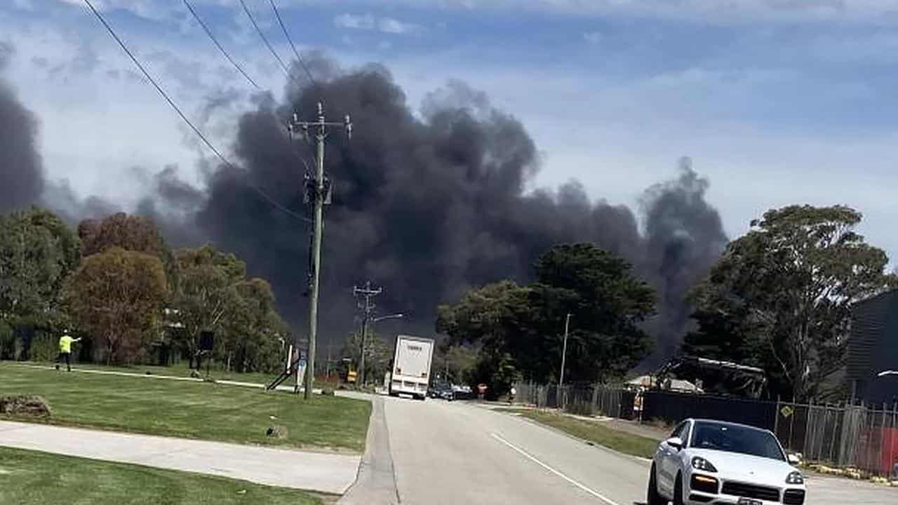 Smoke from a large factory fire at a paint factory in Dandenong South