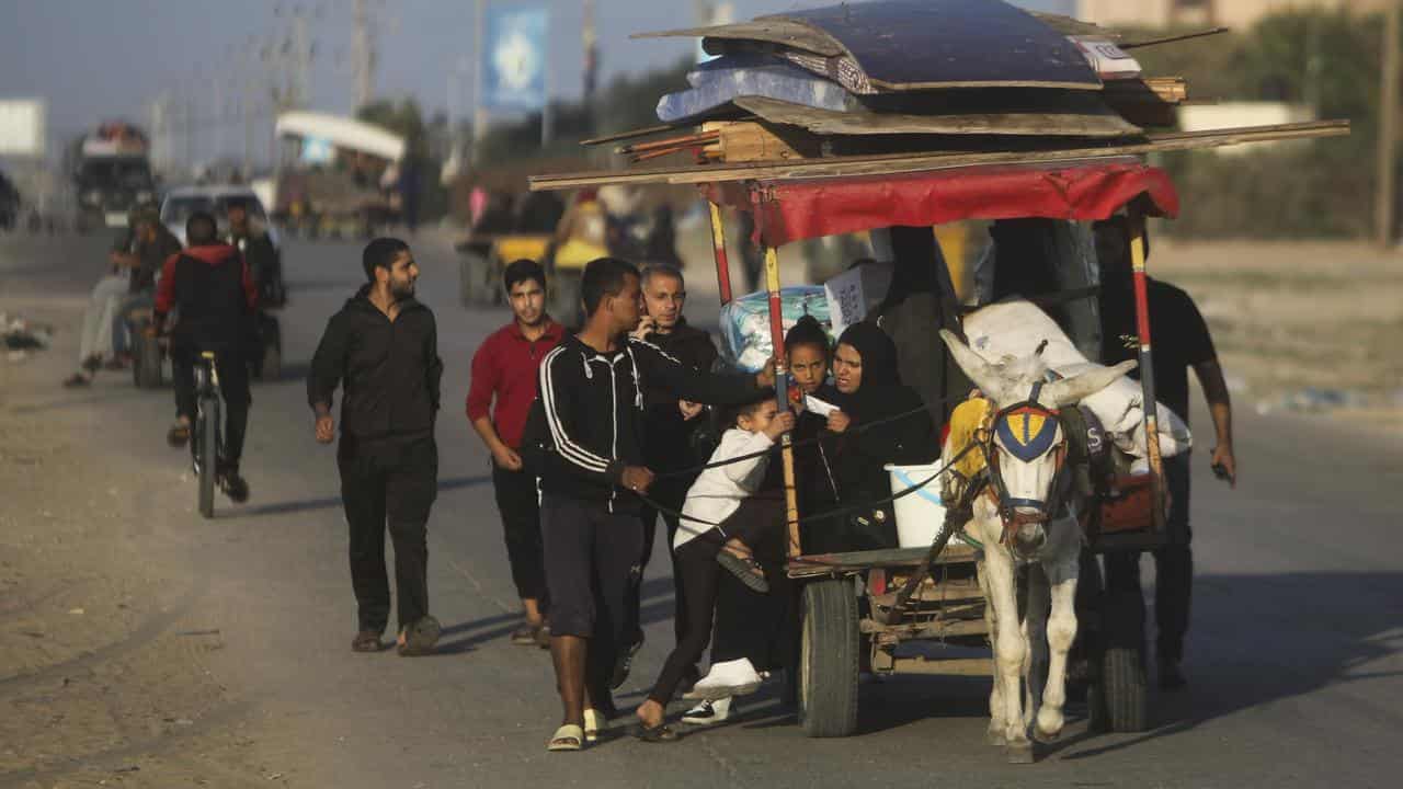 Palestinians flee the Israeli ground offensive in Khan Younis,