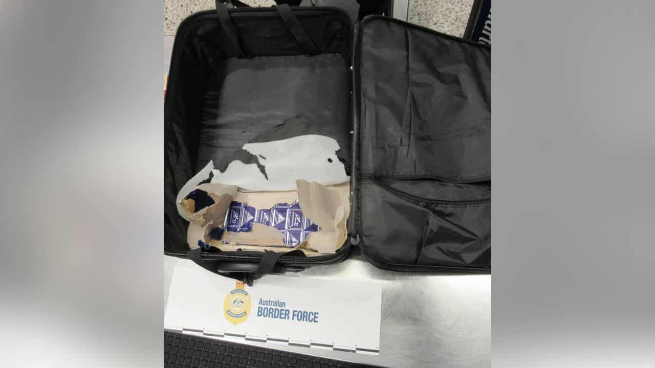 Two kilograms of heroin in the lining of a suitcase