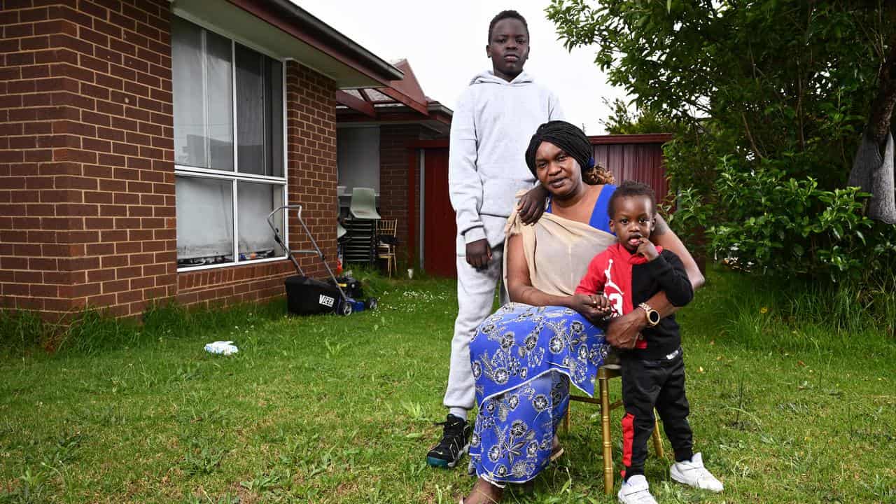 South Sudanese refugee Mary Yan with nephews Kuol and Malachi