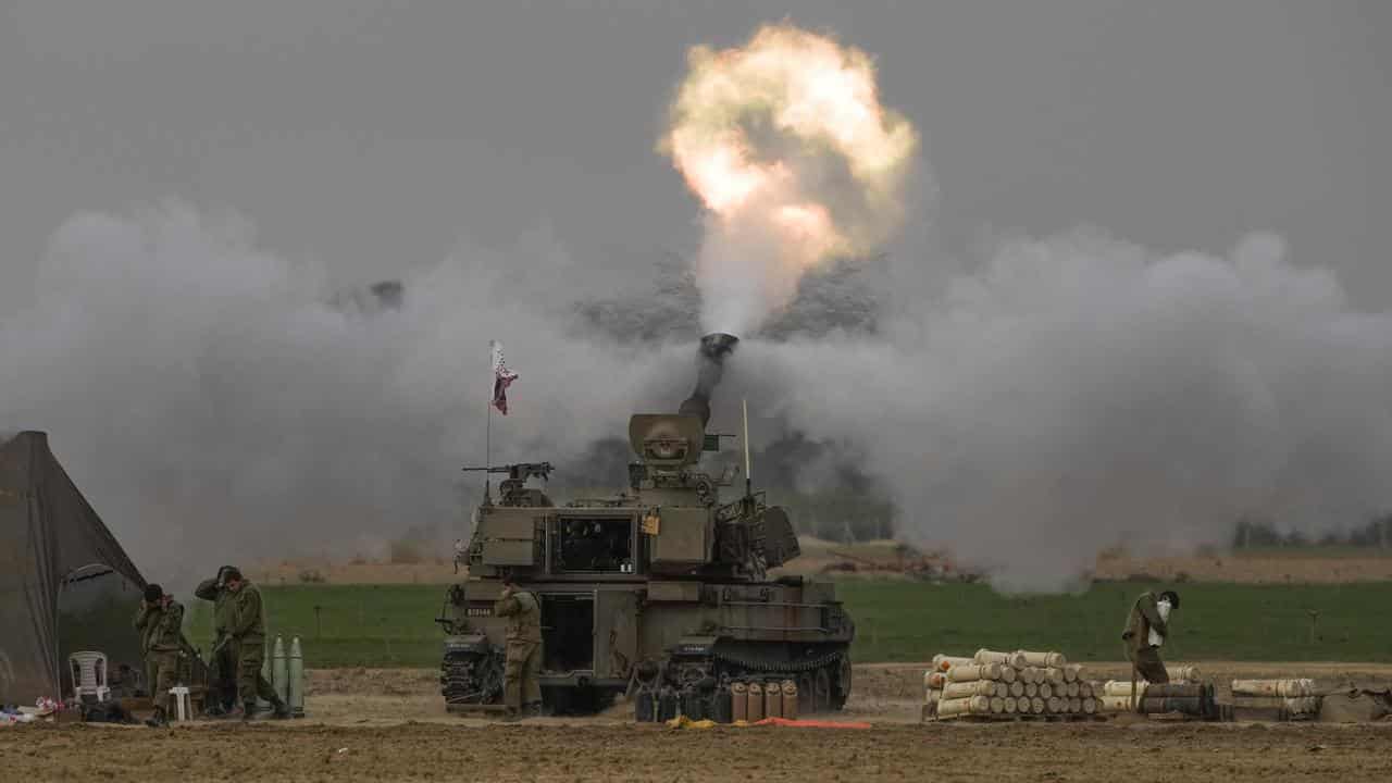 An Israeli mobile artillery unit firing a shell