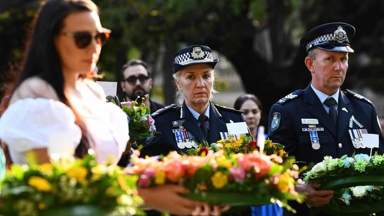 Police Commissioner Katarina Carroll and union head Ian Leavers.