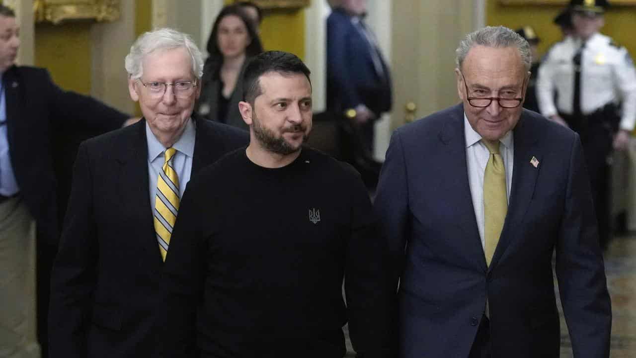 Mitch McConnell, Volodymyr Zelenskiy and Chuch Schumer