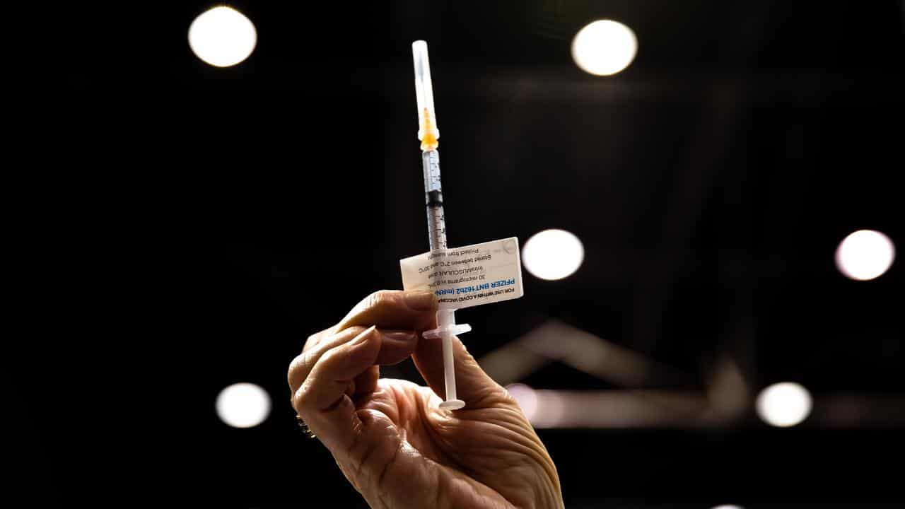 A syringe with a COVID vaccine (file image)