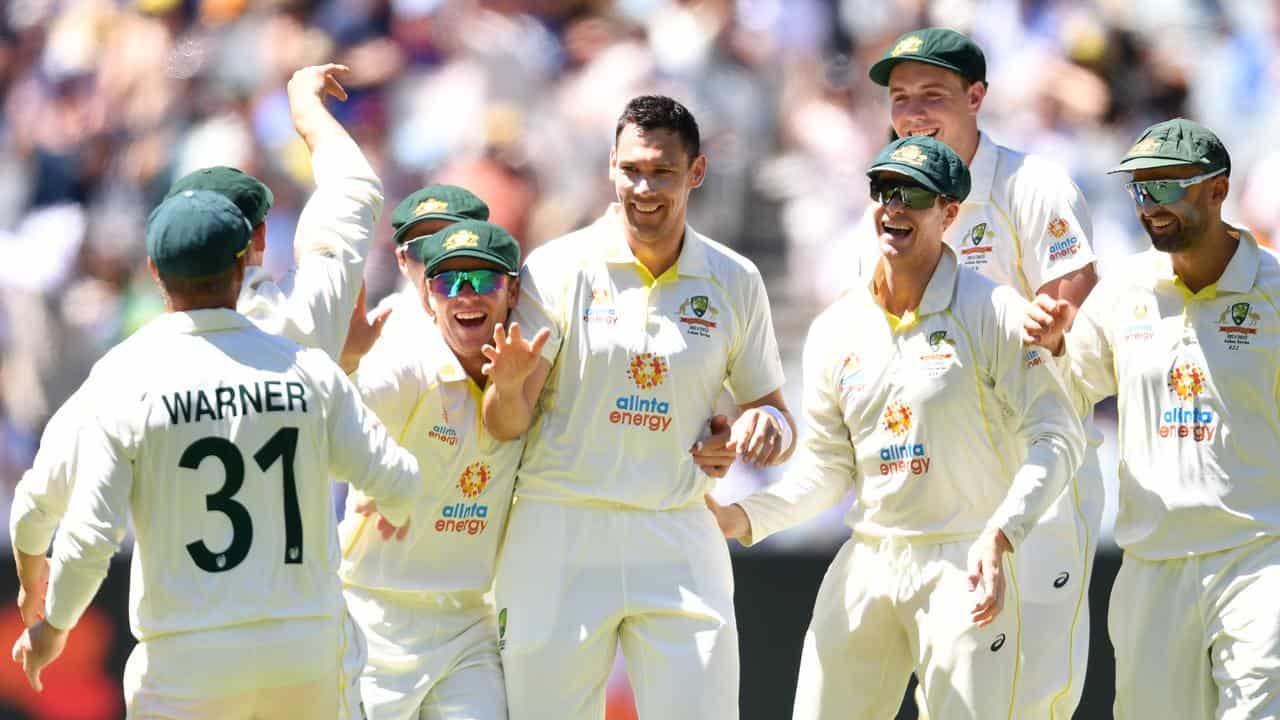 Scott Boland (centre) at the 2021 Boxing Day Test at the MCG.