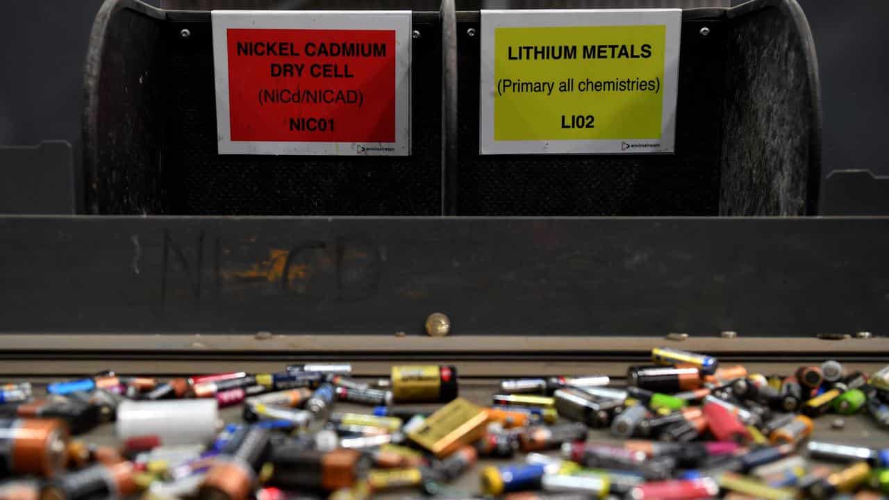 Batteries being sorted a specialised recycling centre.