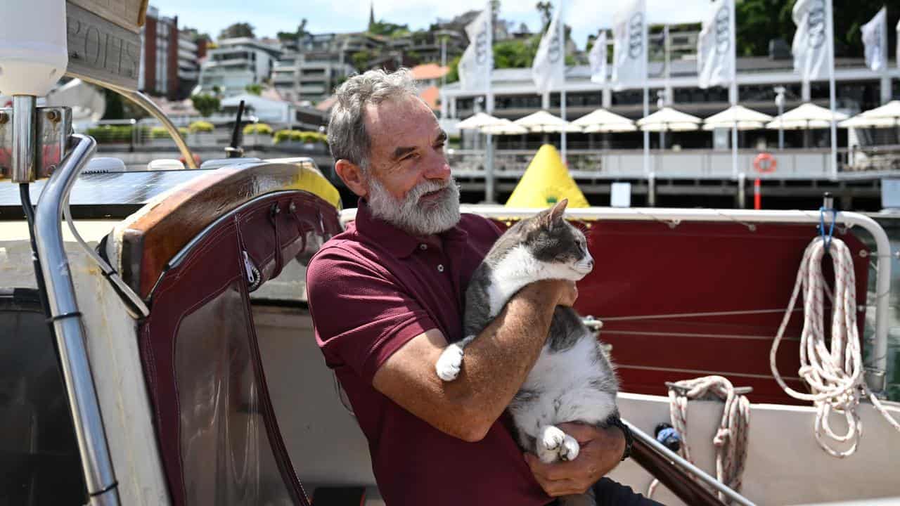 Robert ‘Bob’ Williams with his cat Oli.