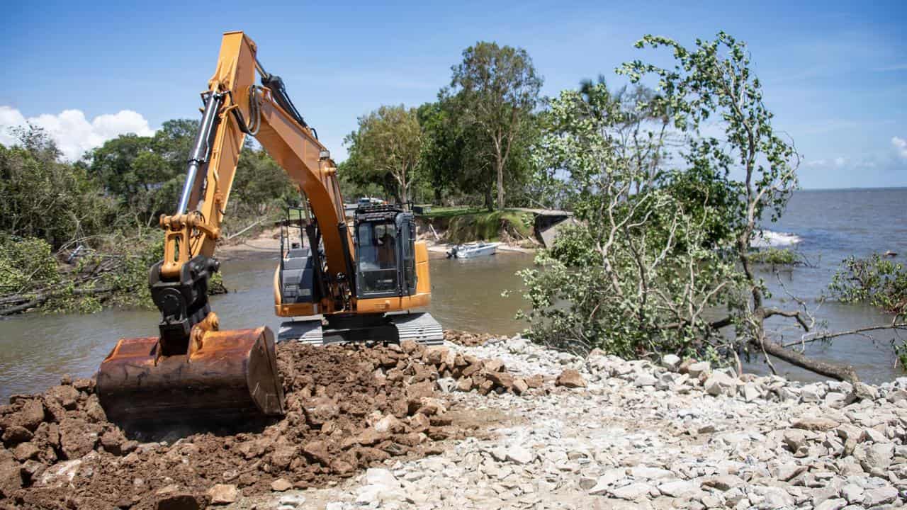 Earthmover doing restoration work in Cairns.