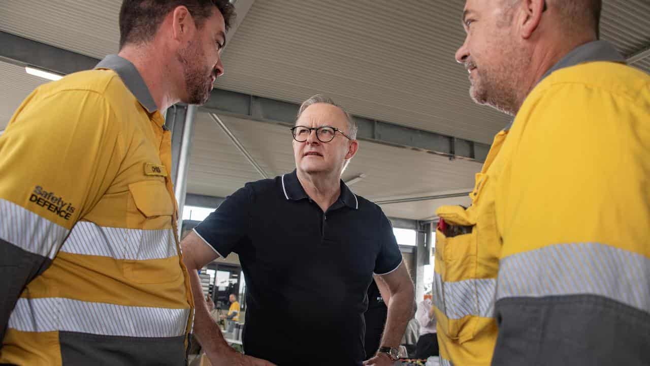 Prime Minister Anthony Albanese with Ergon Energy workers