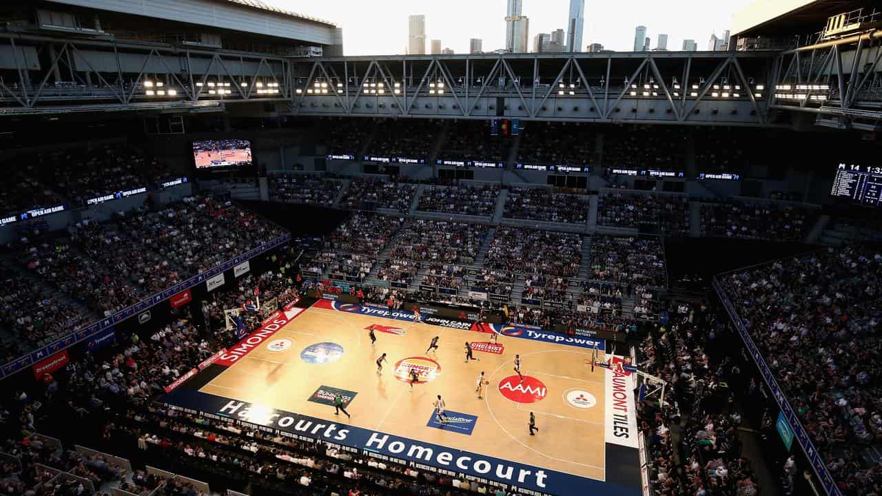 Melbourne skyline visible from the open roof of the John Cain Arena.