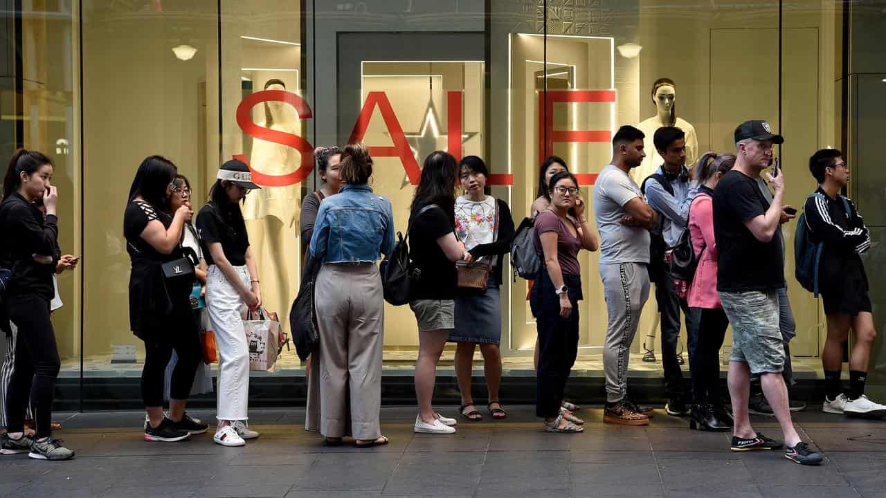 Shoppers line up for Boxing Day sales.