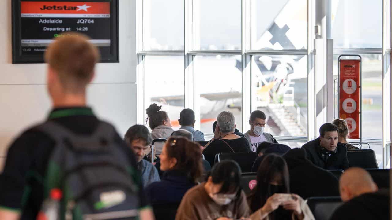 Passengers waiting to board a Jetstar flight at Sydney Airport