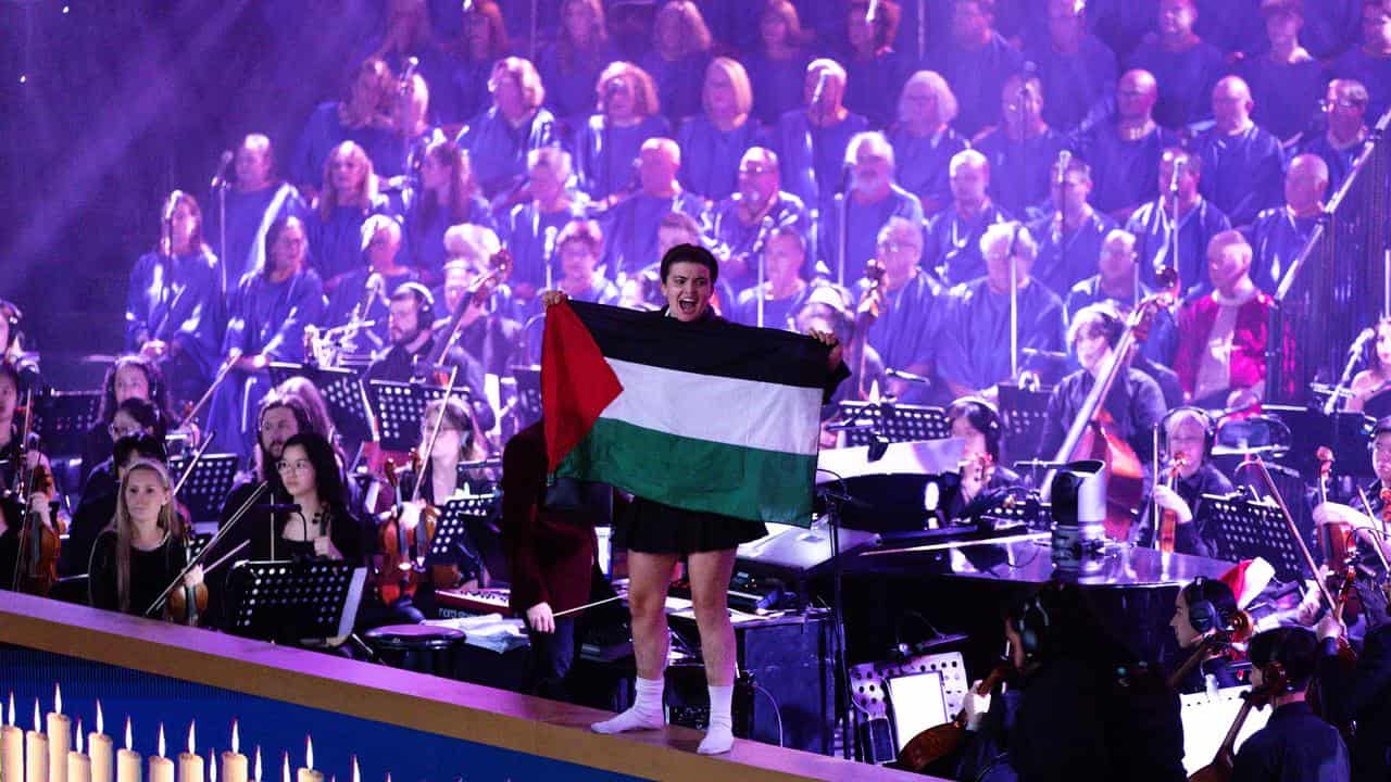 Pro-Palestine protesters interrupt the Carols by Candlelight.