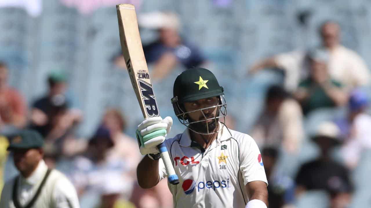 Pakistan's Abdullah Shafique celebrates his half-century at the MCG.