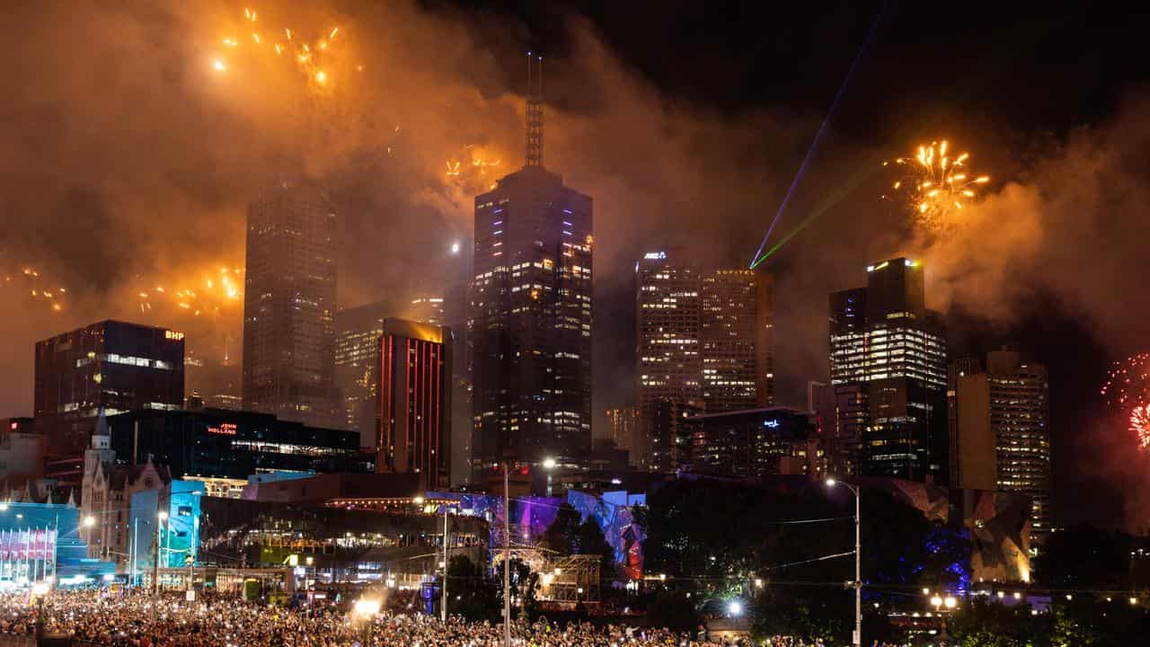 Fireworks on the buildings along the Yarra River