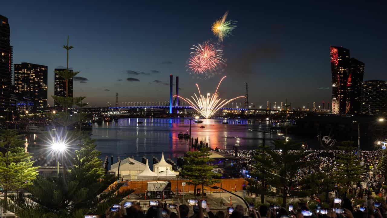 Fireworks are seen above the Bolte Bridge in Dockland