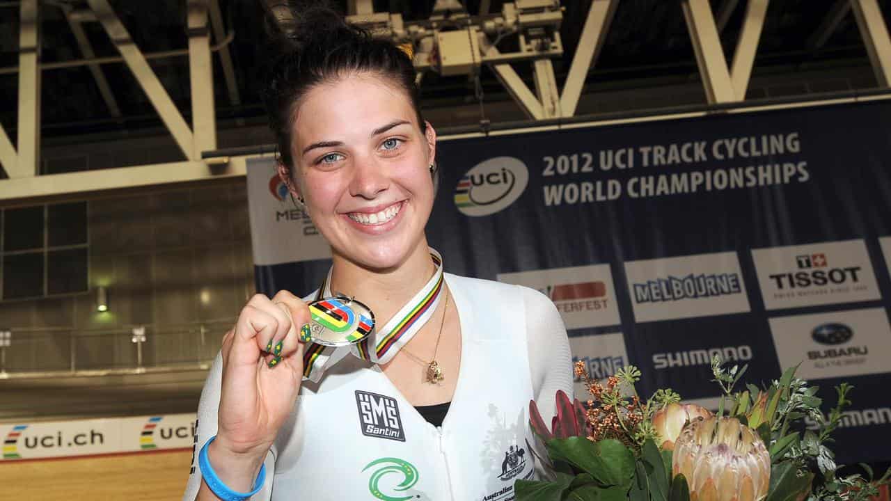 Melissa Dennis, nee Hoskins, poses with her silver medal in 2012.