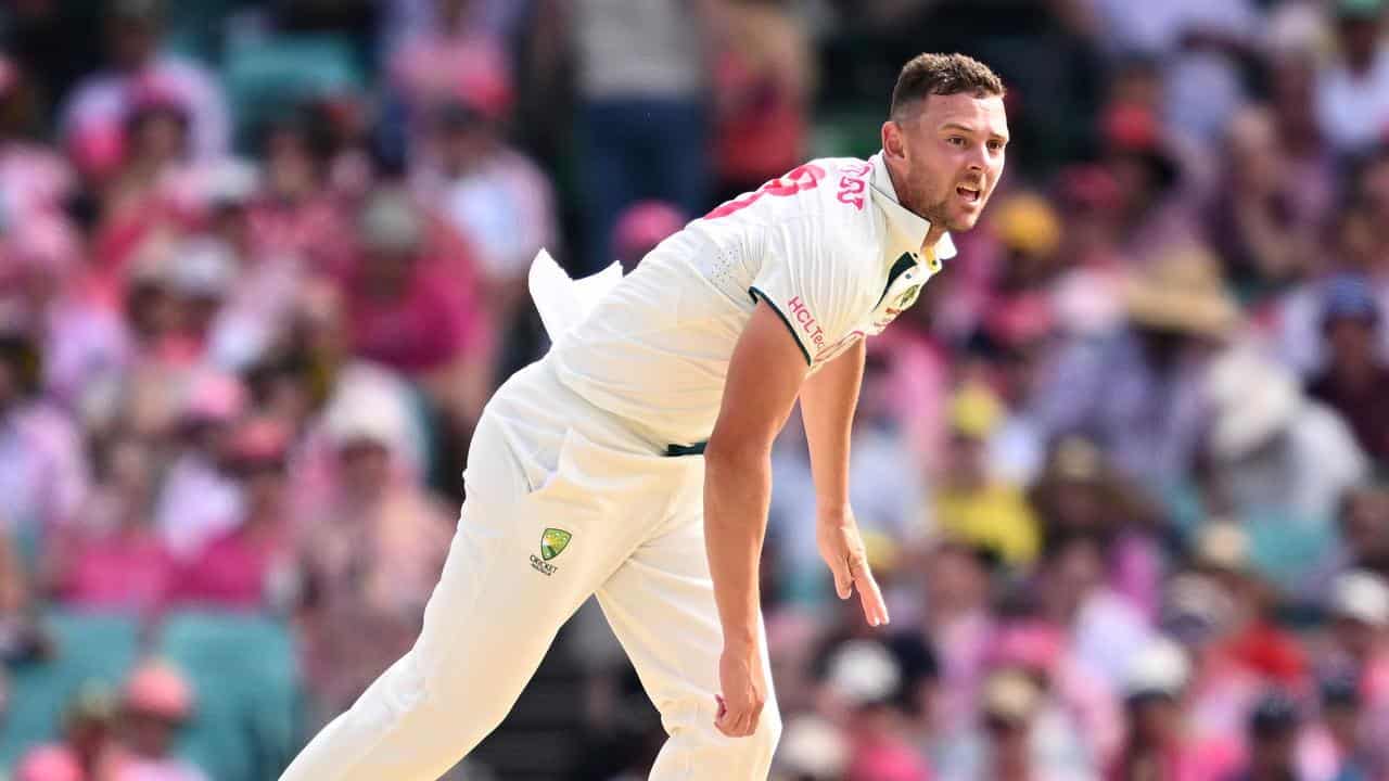 Josh Hazelwood bowls against Pakistan on day three. 