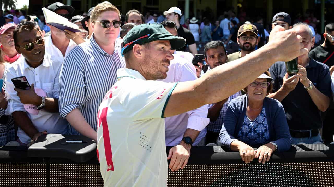 David Warner takes a selfie with fans at the SCG.