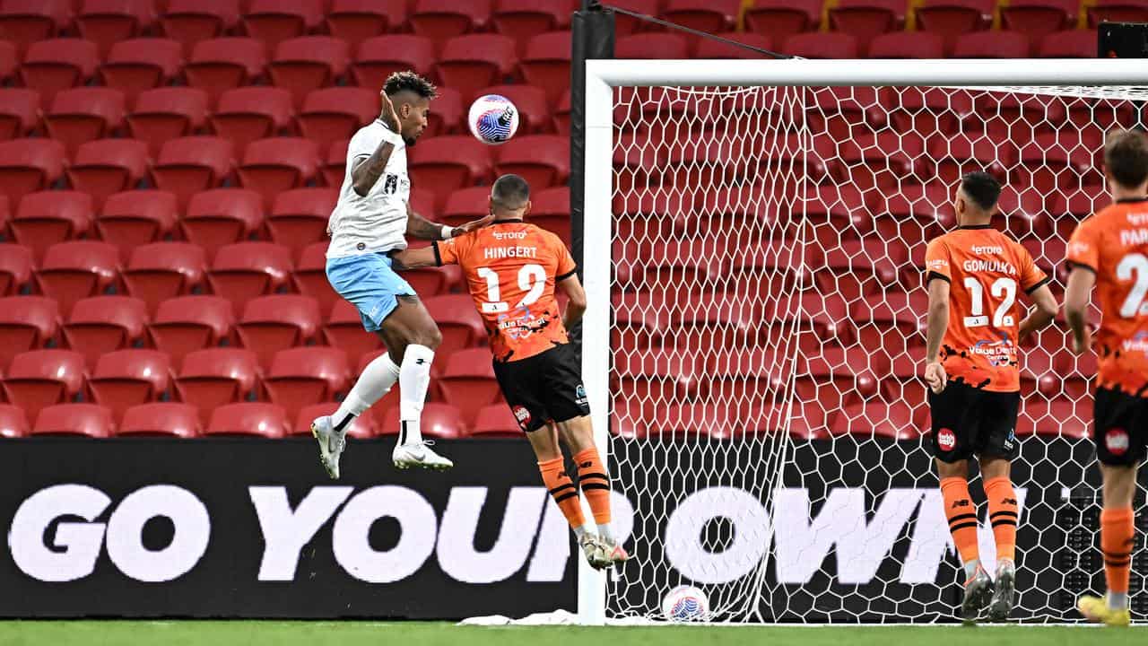 Fabio Gomes puts Sydney FC ahead in the opening minute v Brisbane.