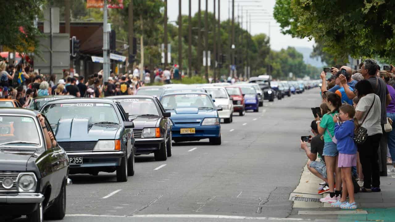 Supercharged cars parade to mark the start of Summernats 36