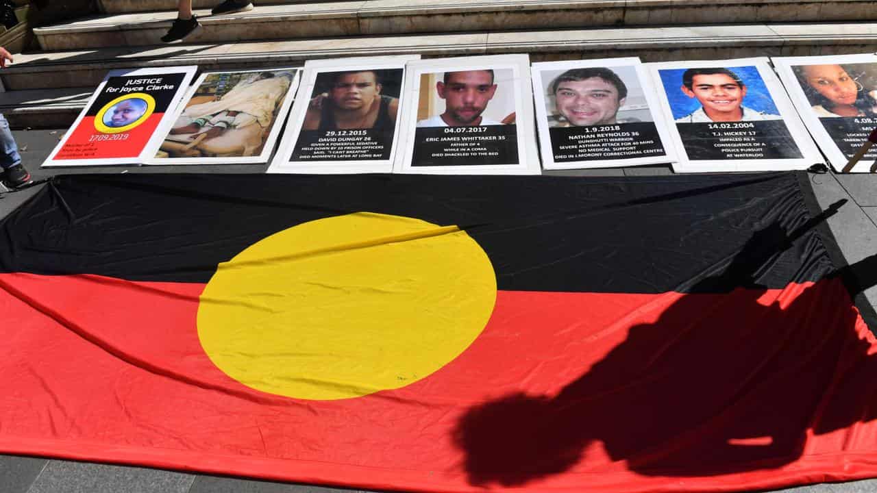 Iindigenous flag and signs of people who died in custody (file image)