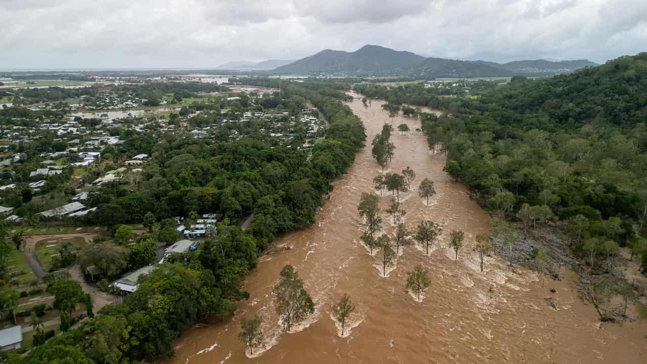 Aerial view of floodwater at Lake Placid in Cairns