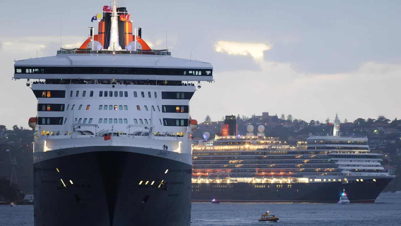 Queen Elizabeth and Queen Mary 2 sailing into Sydney Harbour in 2011