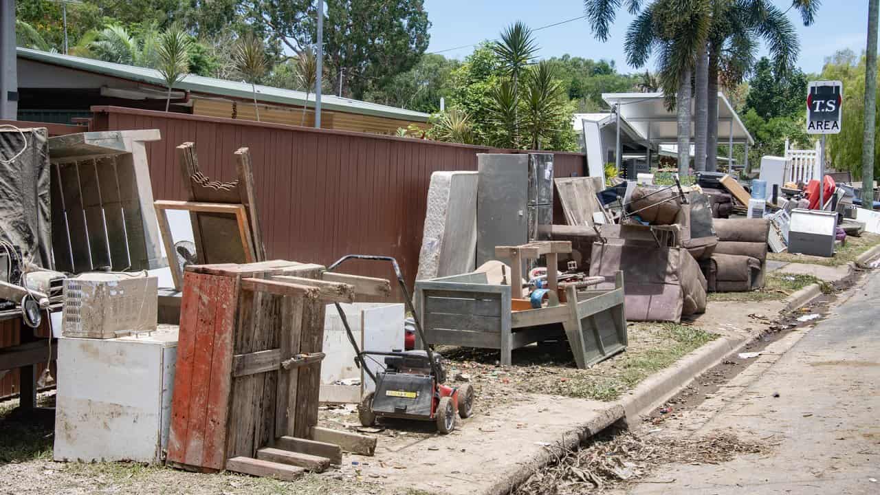 Flood damaged belongings at Machans Beach in Cairns (file image)