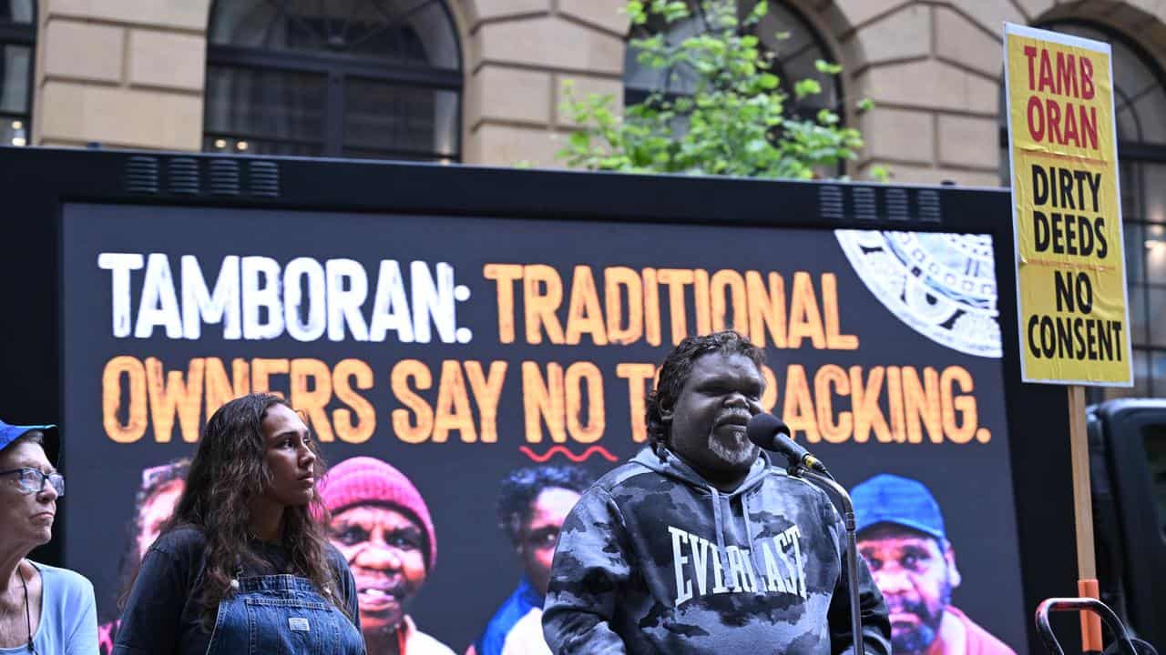 Bradley Farrar addresses protesters outside Tamboran Resources’ AGM