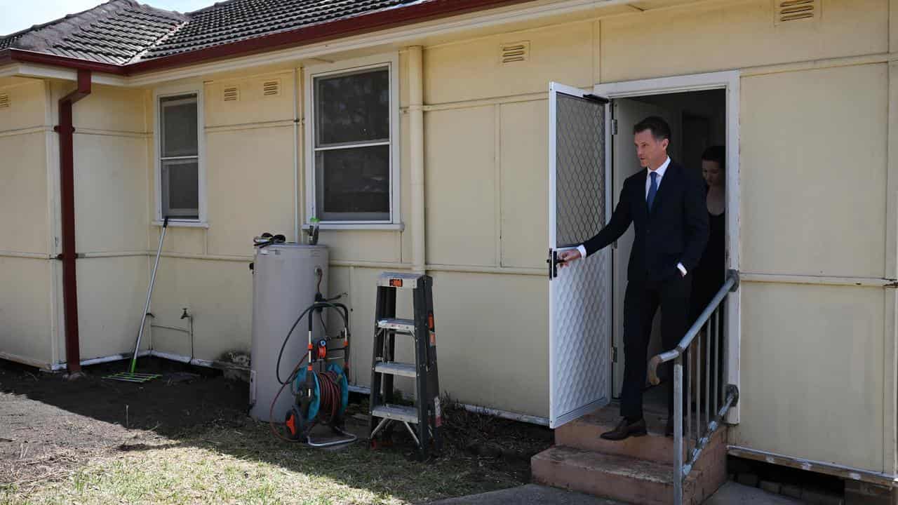 Chris Minns visits a social housing property (file image)