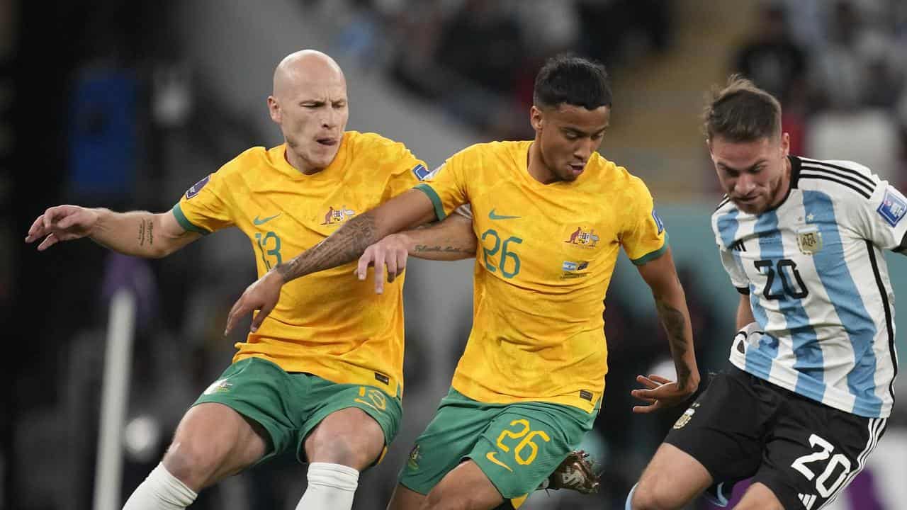 Aaron Mooy (13) and Keanu Baccus (26) for the Socceroos v Argentina.