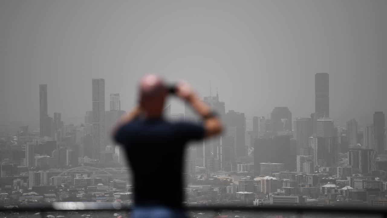 Man takes photo of smoke haze in Brisbane.