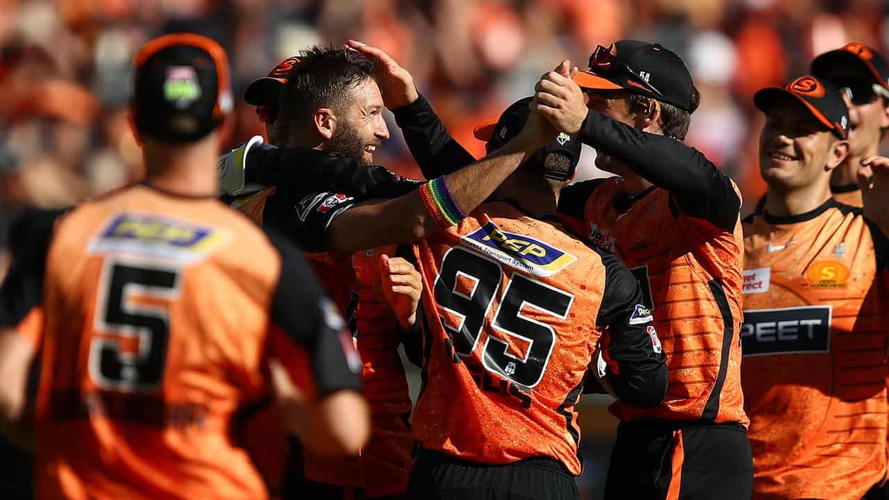 Scorchers' AJ Tye is congratulated.