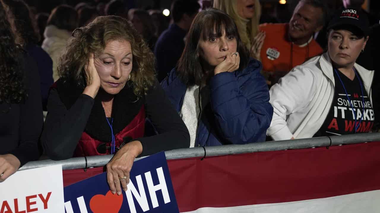 Supporters of Nikki Haley react as election results come in