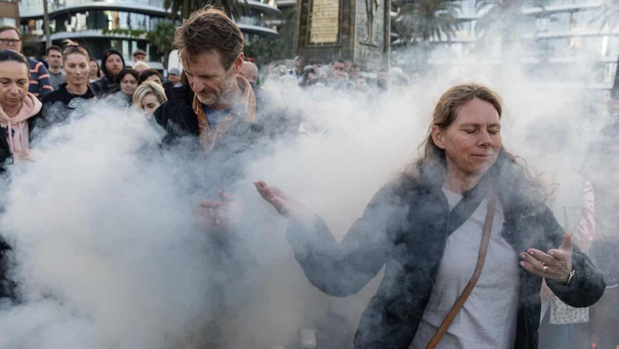 Smoking ceremony at Melbourne's Alfred Square.