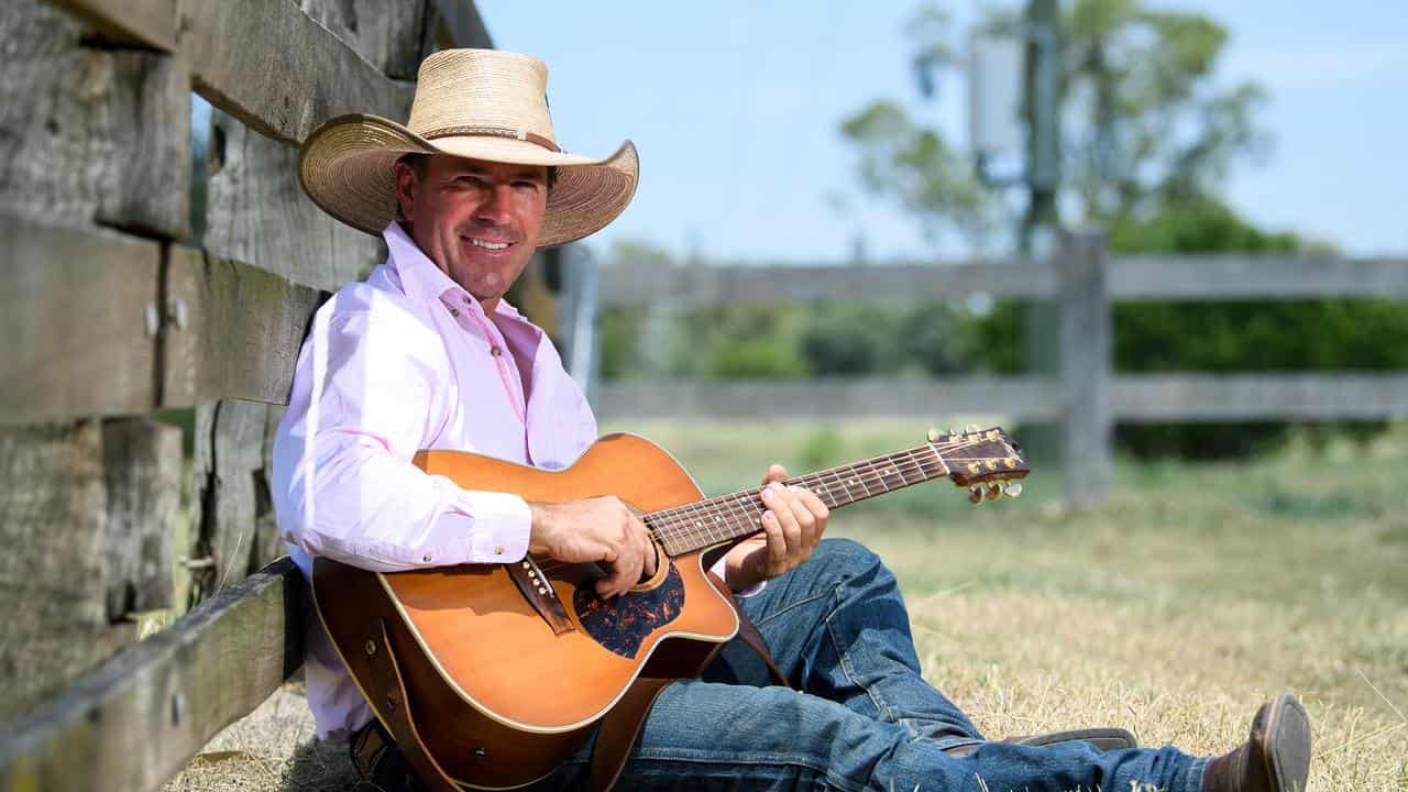 Tom Curtain poses for a photo in the Tamworth Country Music Festival.